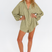 Kiwi green black pinstripe oversized playsuit with balloon sleeves – front view