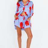 Lilac floral shorts with ruby hibiscus print and drawstring waist – front view