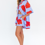 Hibiscus Haze lilac floral shorts with side pockets – side view