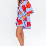 Hibiscus Haze lilac floral shorts with side pockets – side view