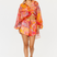 Pink and orange graphic print elastic waist shorts with drawstring and pockets – front view